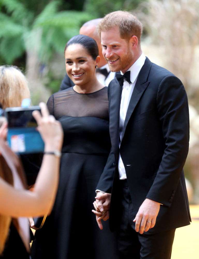 Meghan Markle Spellbinds In A Flattering $2,450 Black Gown With A Sheer Detail At 'The Lion King' Red CarpetMeghan Markle Spellbinds In A Flattering $2,450 Black Gown With A Sheer Detail At 'The Lion King' Red CarpetMeghan Markle Spellbinds In A Flattering $2,450 Black Gown With A Sheer Detail At 'The Lion King' Red Carpet