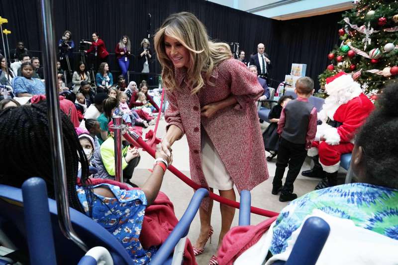 Flaunting Fit Legs! Melania Trump Dons A Chic $1,250 Red Coat At A Christmas Visit To A Children's HospitalFlaunting Fit Legs! Melania Trump Dons A Chic $1,250 Red Coat At A Christmas Visit To A Children's HospitalFlaunting Fit Legs! Melania Trump Dons A Chic $1,250 Red Coat At A Christmas Visit To A Children's Hospital