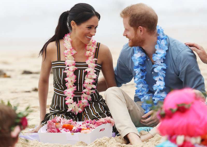 Meghan Markle And Prince Harry Hang Out At The Beach As The Duchess Proudly Rocks A Hint Of Baby BumpMeghan Markle And Prince Harry Hang Out At The Beach As The Duchess Proudly Rocks A Hint Of Baby Bump